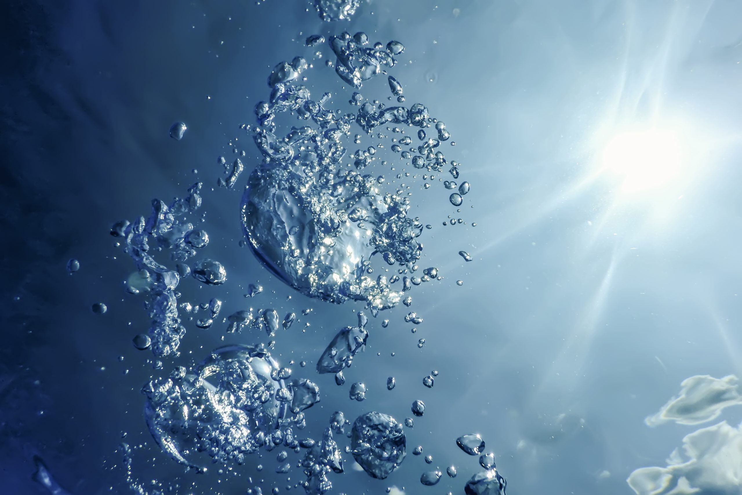 Underwater Air Bubbles with Sunlight. Underwater Background Air